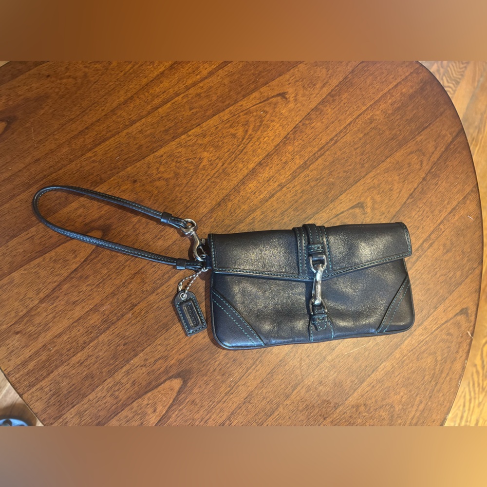 Coach black leather wristlet with blue stitching